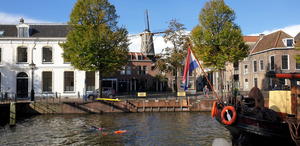 photo of Björn (orange suit) during the branders Zwemtocht in Schiedam 2020